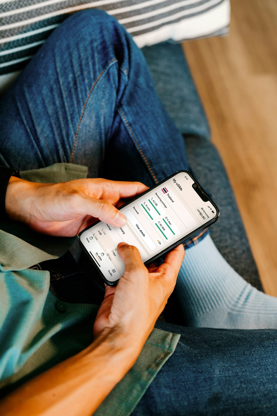 person using retirement calculator app