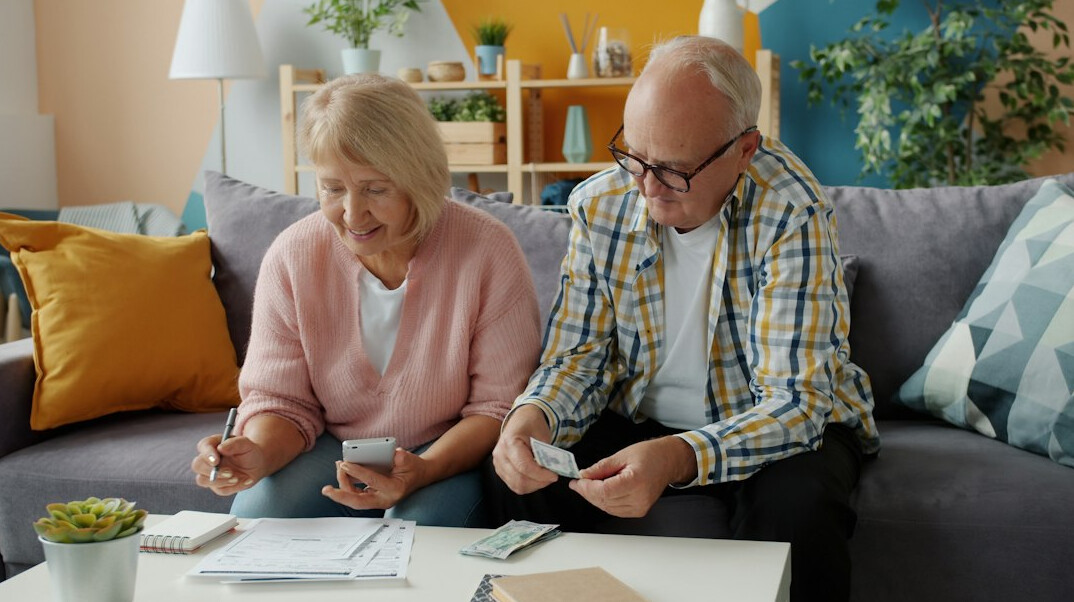 retired couple reviewing documents